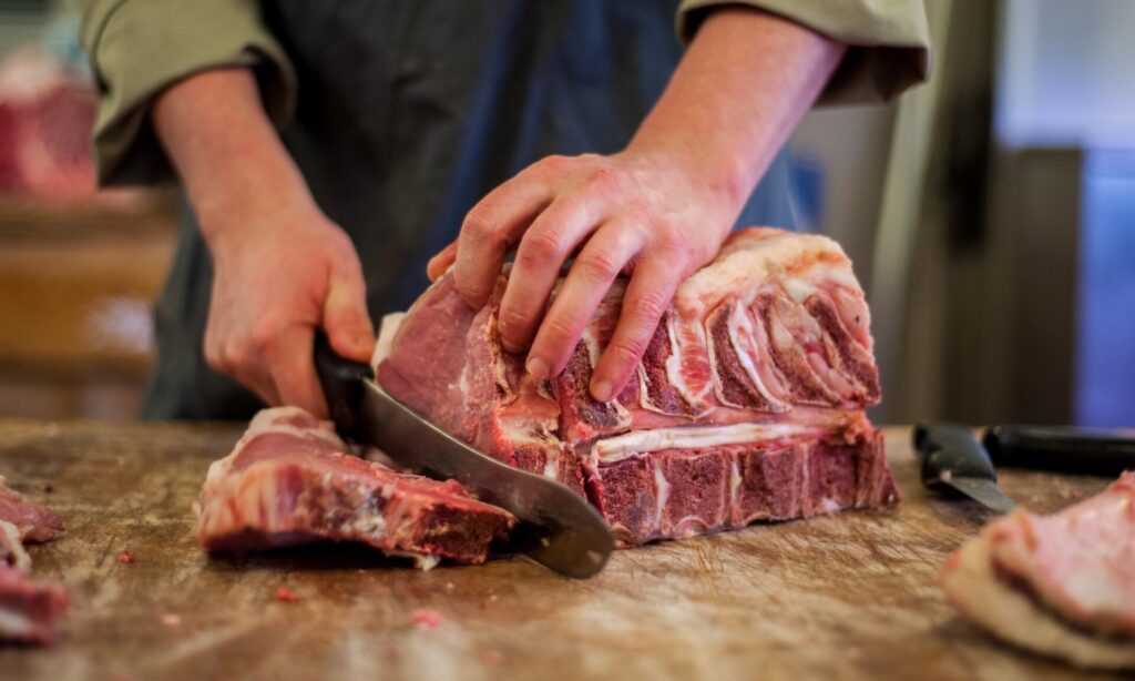 Ginger Pig butcher demonstrating during a butchery class