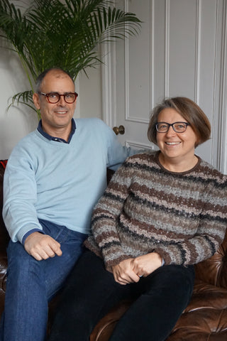 Couple sitting on sofa